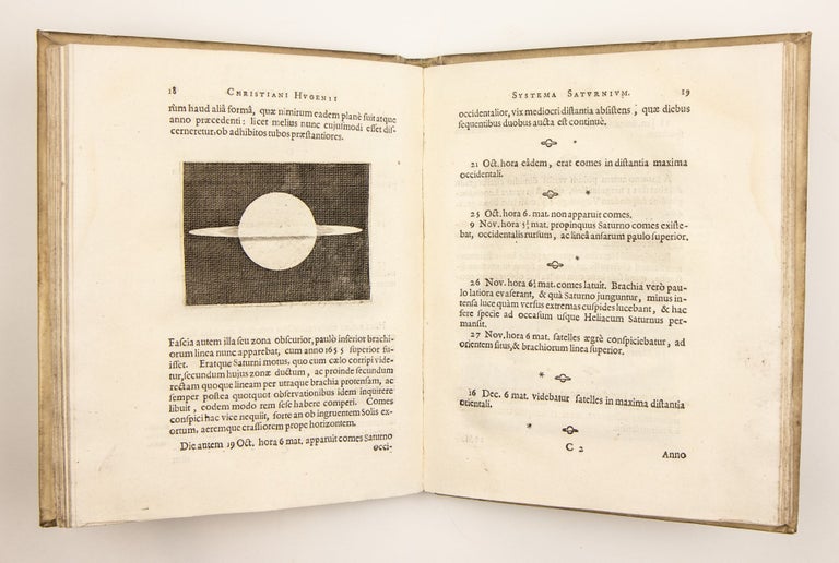 Systema Saturnium, sive de causis mirandorum Saturni phaenomenon, et comite eius planeta novo.